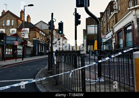 Forest Hill, South East London. UK. 25th March 2019. Police cordon off Dartmouth Road the scene of a stabbing; as schoolboy  fights for his life after being stabbed on Dartmouth - south east London. Credit: Paul Iwala/Alamy Live News