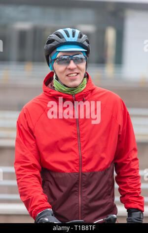 handsome mature man who standing in bicycle Stock Photo