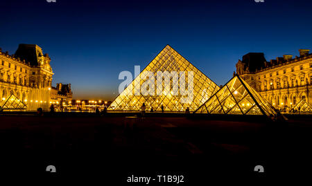 Louvre Pyramid at night - Paris, France Stock Photo