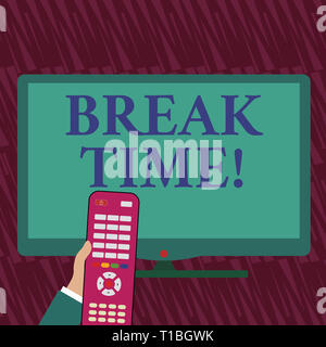 Text sign showing Break Time. Business photo showcasing scheduled time when workers stop working for brief period Hand Holding Computer Remote Control Stock Photo