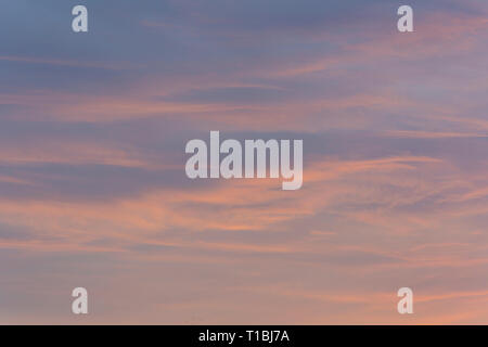 Sunset sky with orange and dark blue colors. Stock Photo