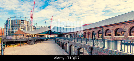 Panorama view of Coal Drops Yard, with its Inception-style roofs, is a retail development in the King's Cross Central scheme in London Stock Photo