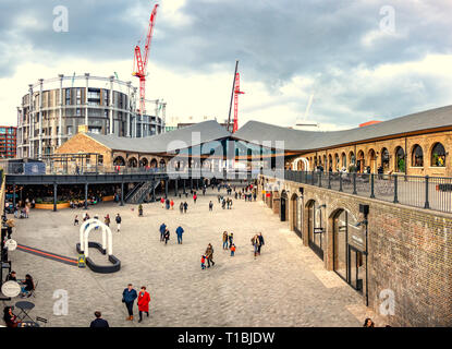 Coal Drops Yard, with its Inception-style roofs, is a retail development in the King's Cross Central scheme and the Gasholders Contemporary Apartments Stock Photo