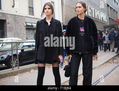 MILAN, Italy: 24 February 2019: Fashion bloggers in street style outfit after Dolce & Gabbana fashion show during Milan fashionweek Stock Photo