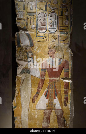 Berlin. Germany. Ancient Egyptian painted fragment of a pillar depicting King Seti I in front of the god Osiris. New Kingdom Period, 19th Dynasty, ca. Stock Photo
