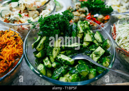 Salmon Salad with spinach, cherry tomatoes, corn salad, baby spinach, fresh mint and basil. Home made food. Concept for a tasty and healthy meal. Dark Stock Photo