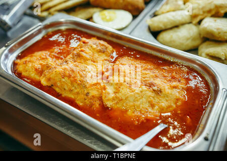 banquet table with heater dish, in dining room Stock Photo