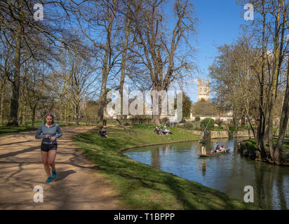 People enjoy the sunshine by the River Cherwell on a bright spring day in Oxford. Stock Photo