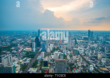 Aerial View of Bangkok Cityscape with Skyline during sunset. The Capitalcity of Thailand.