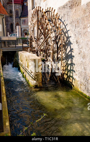 old mill wheel at the water of iron in Bad Urach at the river Stock Photo