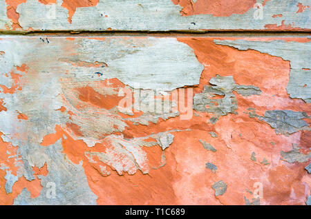 Texture of the Wall of Red Stone. Peeling Cement Plaster Background Stock Photo