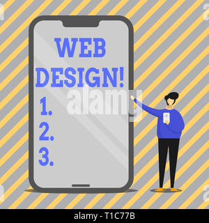 Writing note showing Web Design. Business concept for process of creating websites content production and graphic Man Presenting Huge Smartphone while Stock Photo