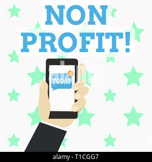 Writing note showing Non Profit. Business concept for not making or conducted primarily to make profit organization Human Hand Holding Smartphone with Stock Photo