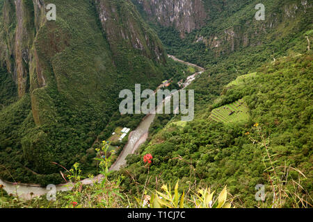 Aerial View of Aguas Calientes Town and Urubamba River as Seen from Huayna Picchu Mountain, Machu Picchu, Cusco Region of Peru Stock Photo