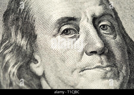 Benjamin Franklin's portrait on one hundred (100) american dollar bill. Macro close up view. Stock Photo