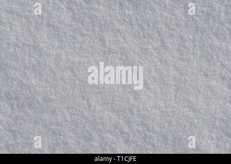 Texture of white fresh snow as background. Stock Photo