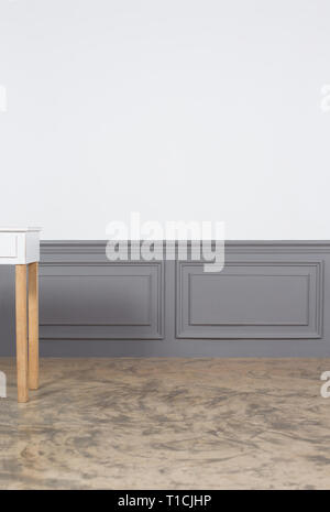 Classic white empty interior with wall panels and concrete floor Stock Photo