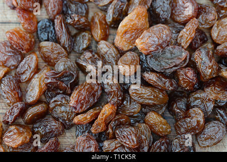 group of raisins on wooden table mac ro Stock Photo