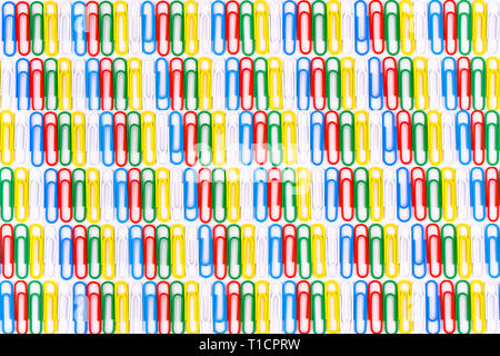 Set of colored paper clips on white background. Stock Photo