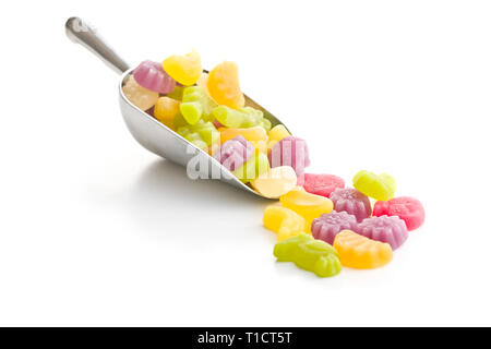 Fruit jelly candies in scoop isolated on white background. Stock Photo