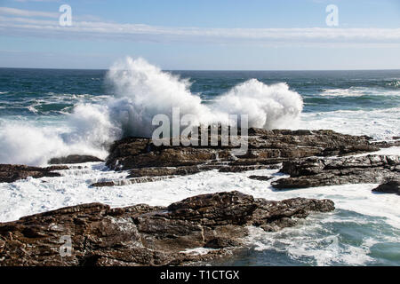 Water wave splashes, isolated on black background Stock Photo