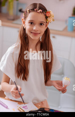 Portrait of charming brunette girl that posing on camera Stock Photo
