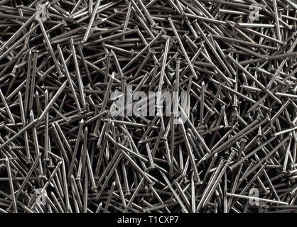 Construction, repair, tools - Abstract metall Pile nails background Stock Photo