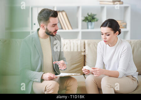 Woman visiting counselor Stock Photo