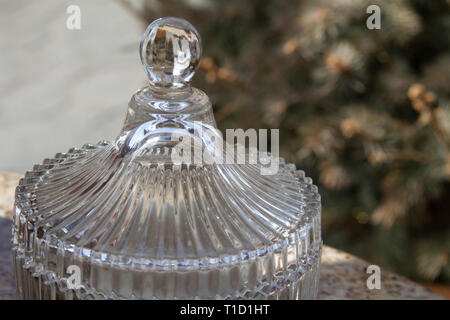 on the marble surface on the background of the Christmas tree, free space for text. Stock Photo