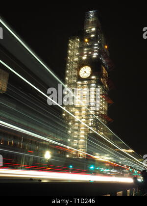 Moving Bus in front of Big Ben under restoration - London Photo: Matteo Lodrini Stock Photo