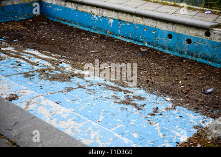 Broken blue azure  retro tiles mosaic in abandoned pool - Berengaria Hotel, Cyprus Stock Photo