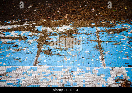 Broken blue azure  retro tiles mosaic in abandoned pool - Berengaria Hotel, Cyprus Stock Photo