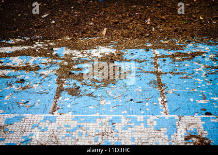 Broken blue azure  retro tiles mosaic in abandoned pool - Berengaria Hotel, Cyprus Stock Photo