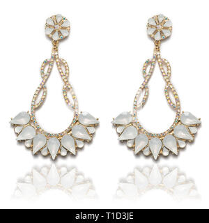 Beautiful earrings set isolated on white background closeup macro Stock Photo