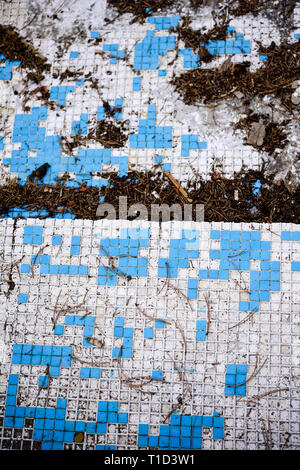 Broken blue azure  retro tiles mosaic in abandoned pool - Berengaria Hotel, Cyprus Stock Photo