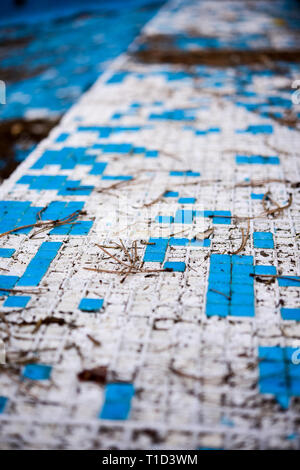 Broken blue azure  retro tiles mosaic in abandoned pool - Berengaria Hotel, Cyprus Stock Photo