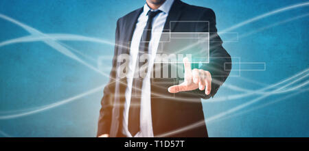 businessman touching virtual screen - modern technology in business Stock Photo