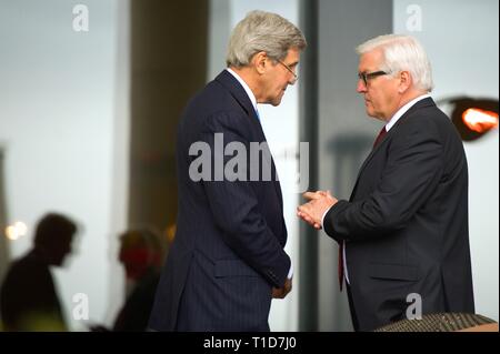 U.S. Secretary of State John Kerry chats with German Foreign Minister Frank-Walter Steinmeier on March 29, 2015, in Lausanne, Switzerland, during a br Stock Photo