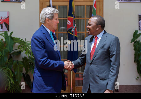 U.S. Secretary of State John Kerry shakes hands with Kenyan President Uhuru Kenyatta in Nairobi, Kenya on May 4, 2015. Stock Photo