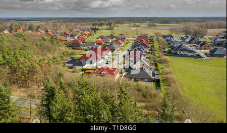 Wolfsburg, Germany, March 18., 2019: Aerial photograph from an oblique angle with a dead-end street and single-family houses, drone photo Stock Photo