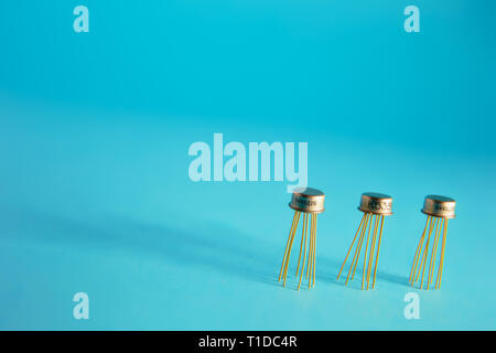 radio components and microcircuits on a blue background, long shadows Stock Photo