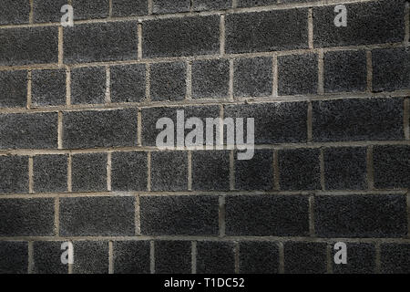 Garage wall lined with black foam block. Stock Photo