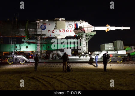 BAIKONUR - The Soyuz rocket MS-03 is beeing rolled out of the assembly hall 112 for transportation to the Gagarin Start launchpad in the early morning Stock Photo