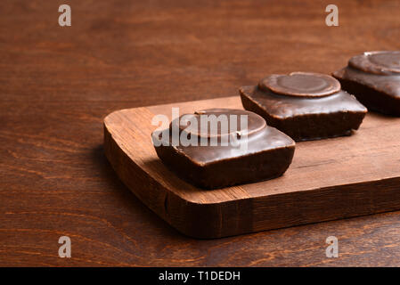 closeup small dark chocolate cakes Stock Photo