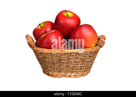 Isolated wicker basket of red apples Stock Photo