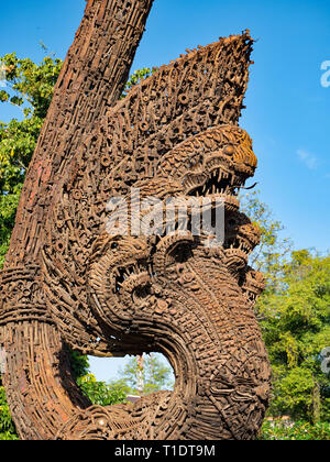 Cambodia monument to peace. Close up of a statue made of old weapons. Constructed in the shape of a mythical serpent, or Naga. 03-12-2018 Stock Photo
