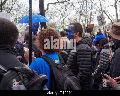 London, England, UK. 23rd March 2019, Man with Painted Blue Face on the Peoples March in London UK. Credit J Walters/Alamy Live News Stock Photo