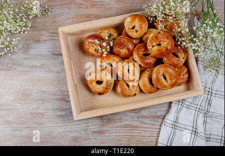 Fresh baked yummy little cinnamon and raisin buns for lunch Stock Photo