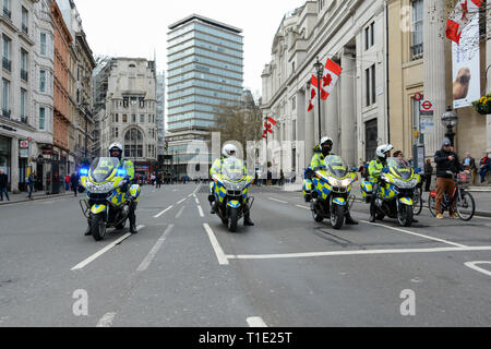 Met Police Motorcycle Traffic Control Division patrolling the People's Vote March in central London, UK Stock Photo