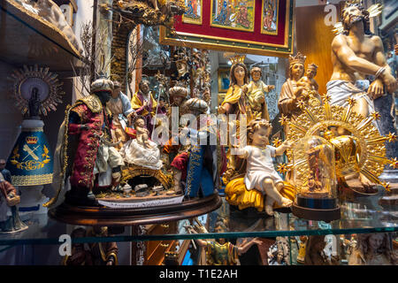 Madrid shop Articulos Religiosos El Angel. Religious articles store, window display with Nativity scenes; baby Jesus and Catholic figurines. Stock Photo